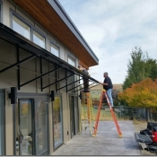 Awning with installer
